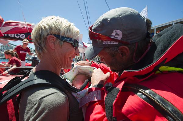 CAMPER skipper Chris Nicholson is reunited with his young son Tully.j